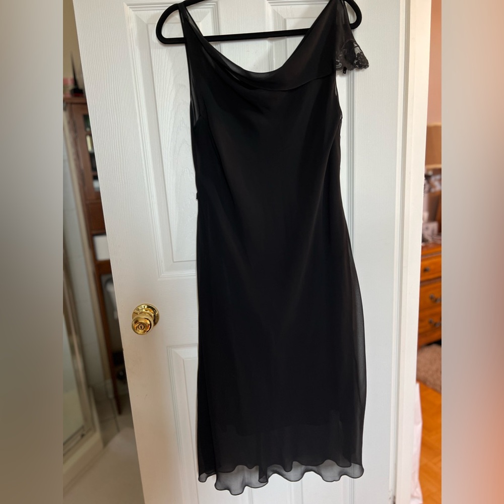 Perfect little black dress. Stretch very comfortable. Size 16. Made in Australia